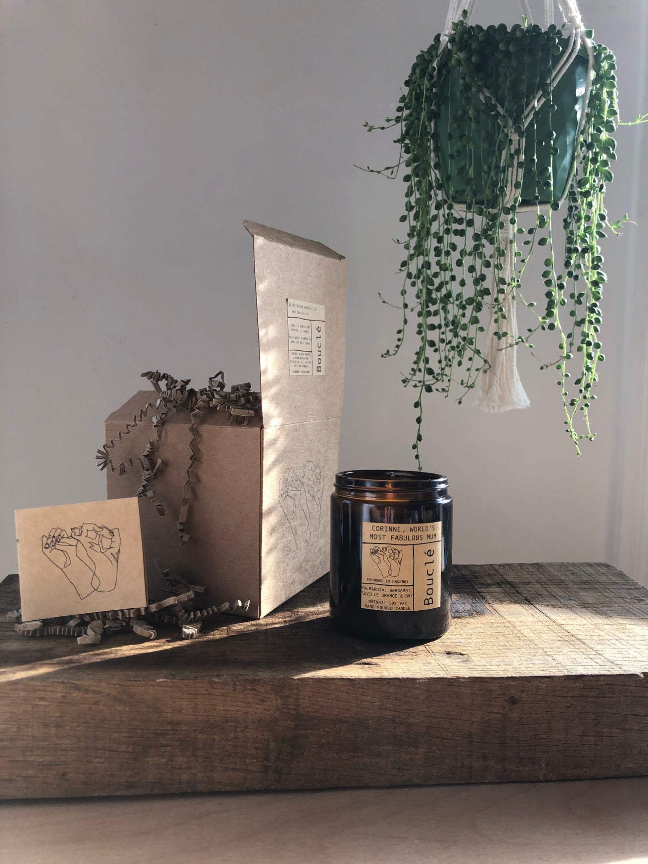 Bouclé London personalised candle in its gift packaging. Made in the UK this makes the perfect bespoke candle gift for her