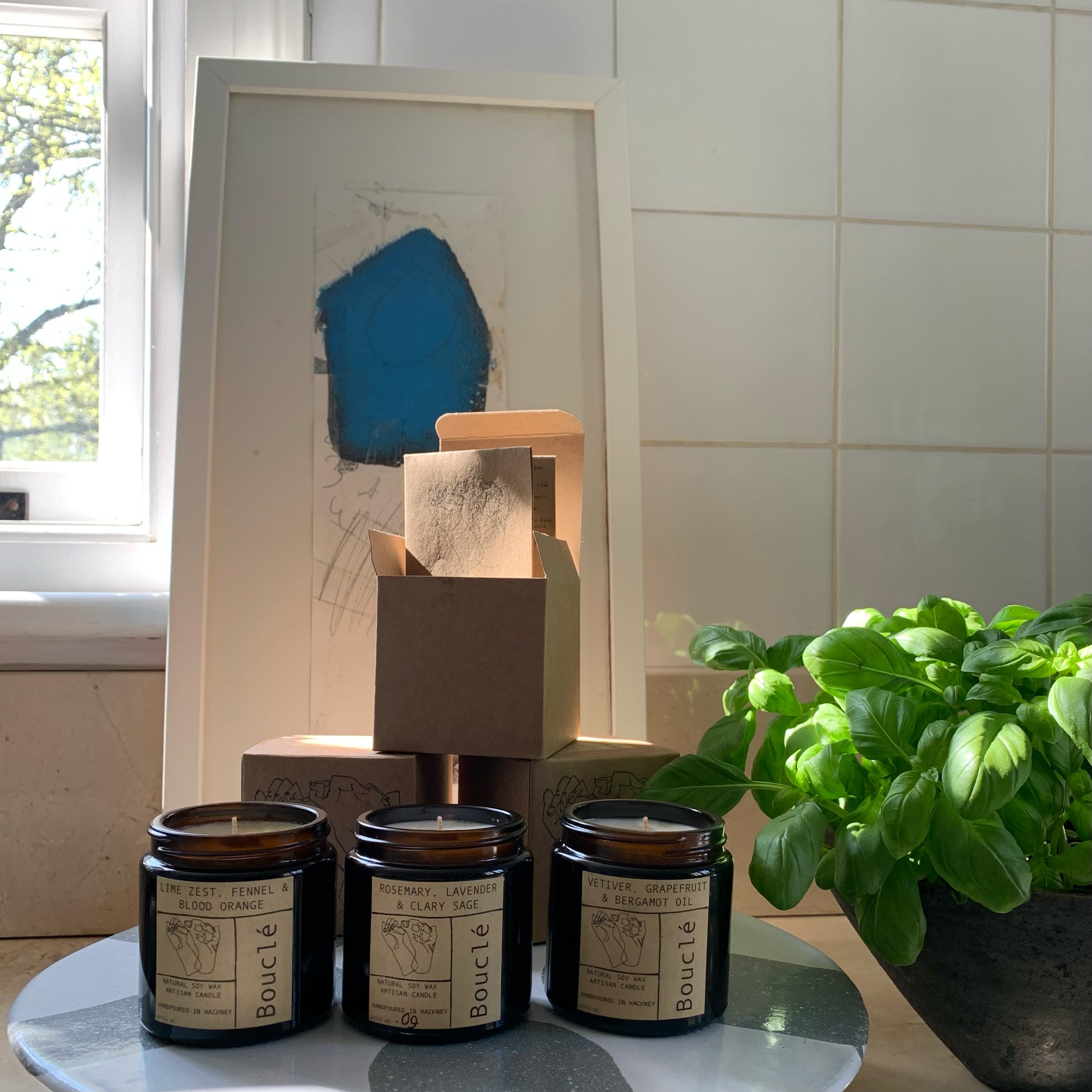 Bouclé hand-poured candle trio – Rosemary Lavender & Clary Sage, Lime Zest Fennel & Blood Orange, Vetiver Grapefruit & Bergamot.