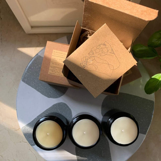 Bouclé London essential oil candle trio aerial view. Ideal for gifting they are made with soy wax and essential oils.