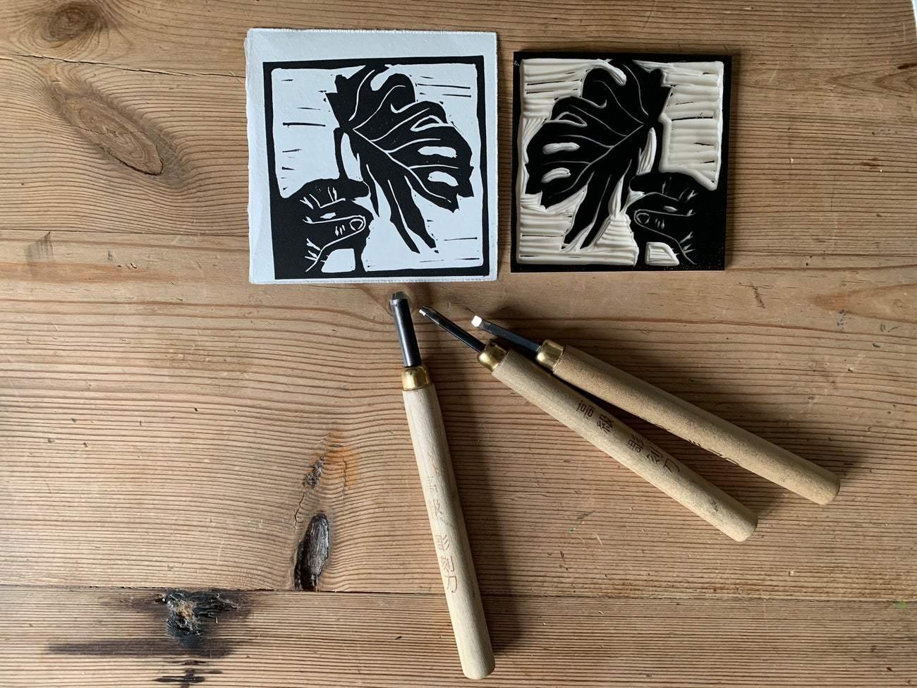 Bouclé London lino-cut block of cheese plant design process image of the hand printing process