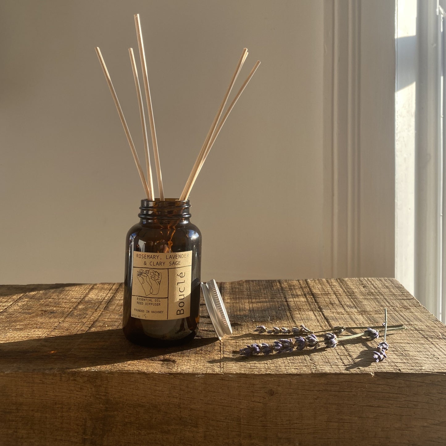 Bouclé London Rosemary, lavender & clary sage rattan reed diffuser for flame free relaxing home fragrance alongside dried lavender