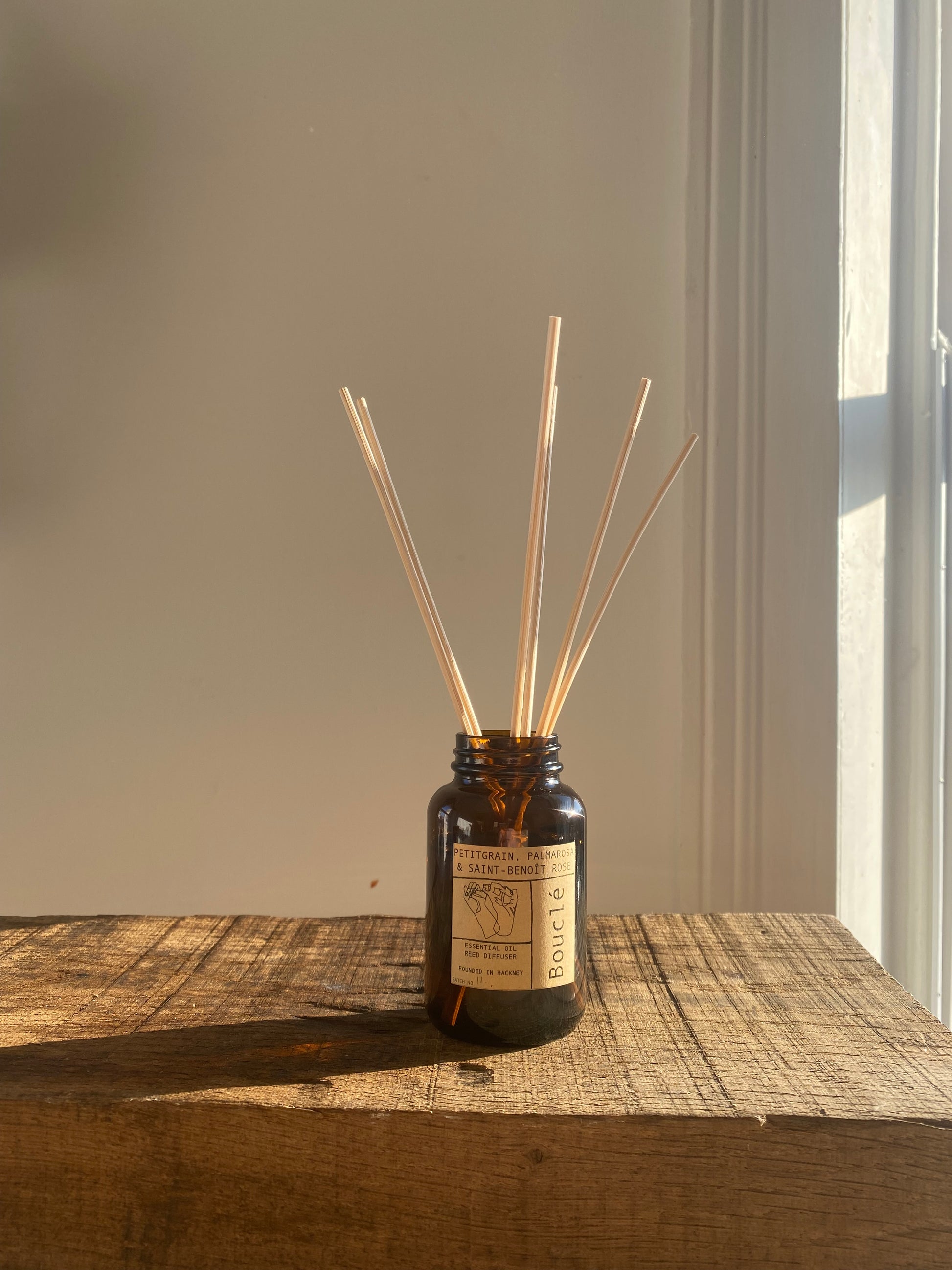Petitgrain, palmarosa & rose essential oil rattan reed diffuser. Made in East London & Brighton.