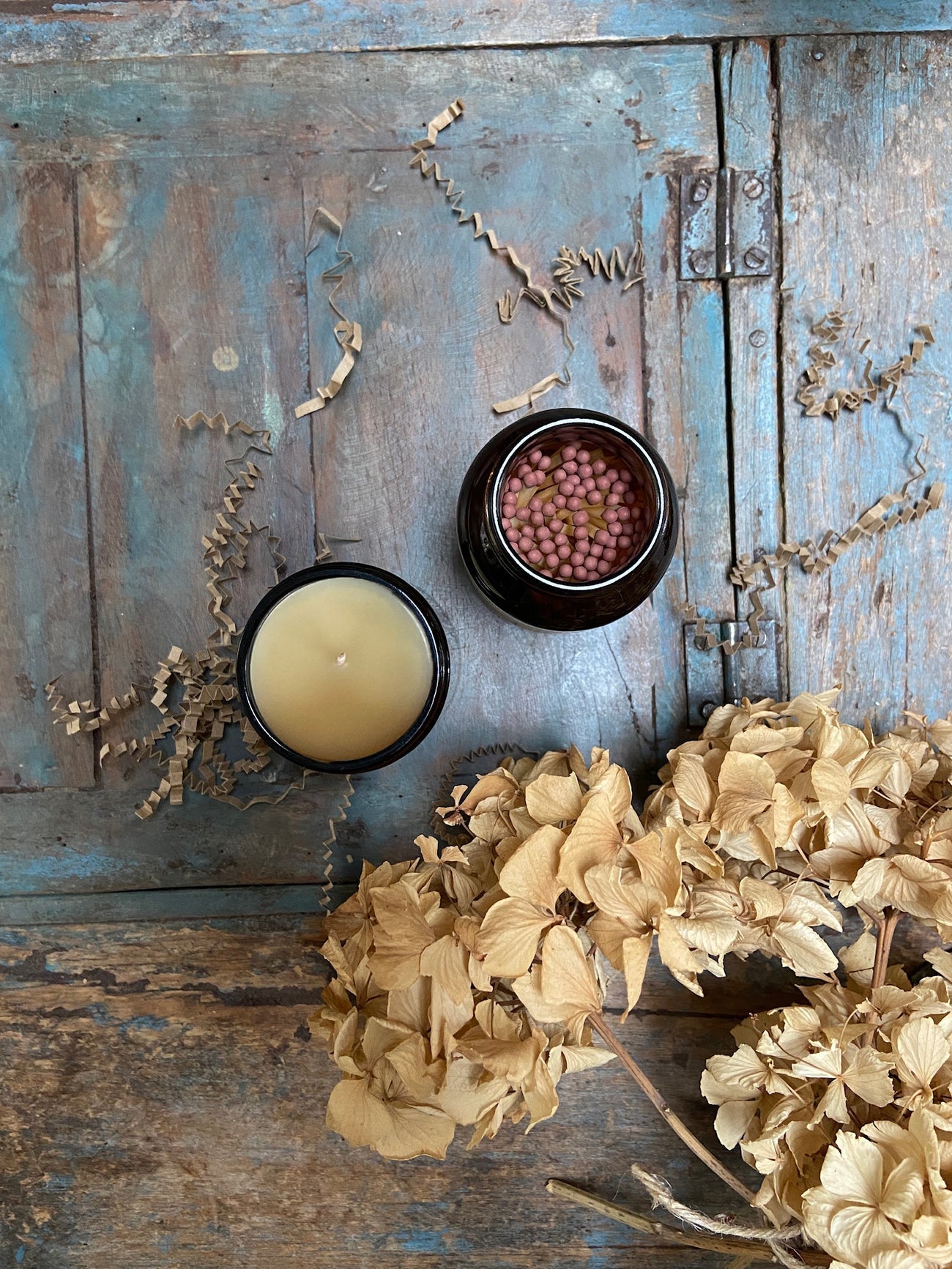 Bouclé match jar and soy wax natural candle gift set on table surrounded by plastic free confetti packaging 