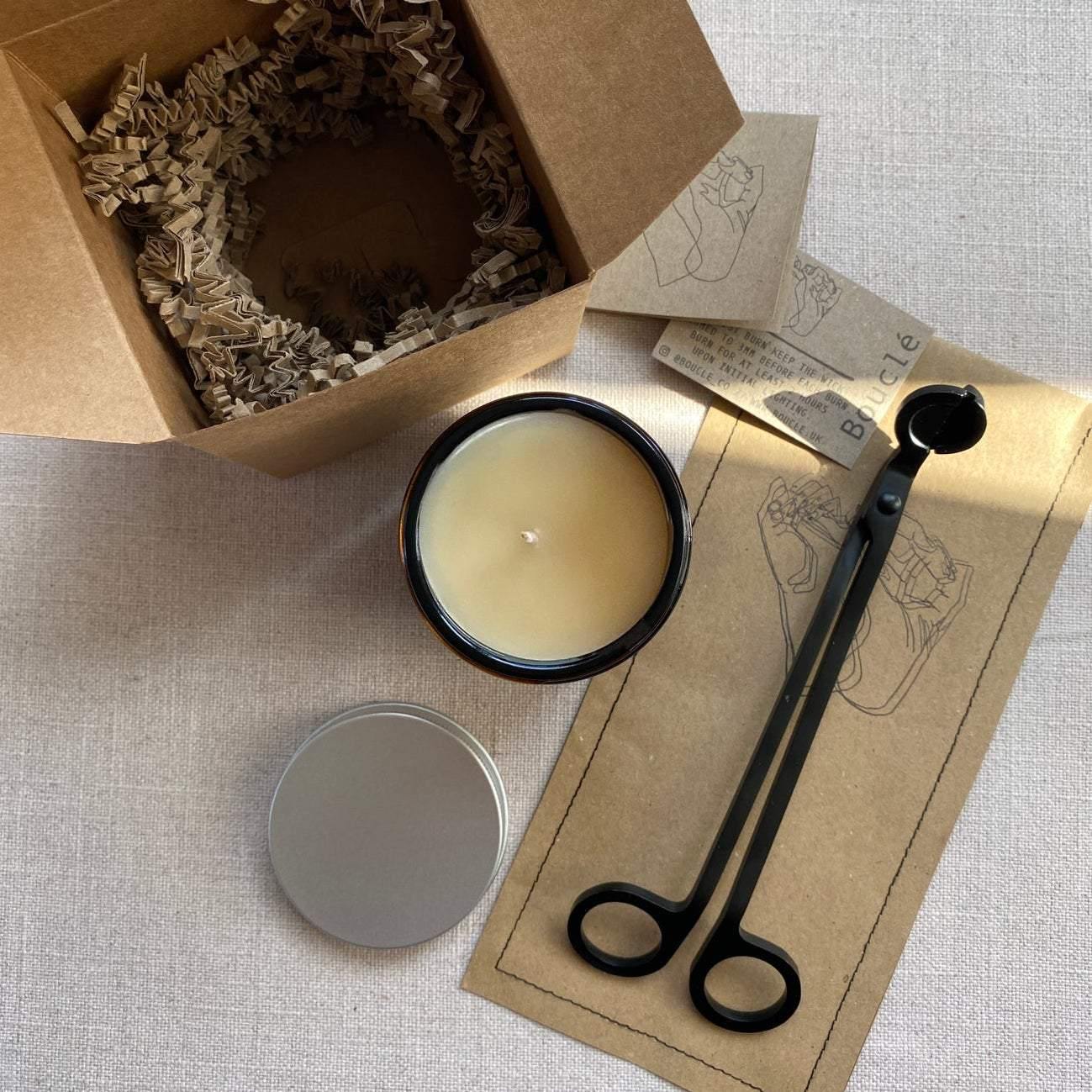 Bouclé London wick trimmer & soy wax candle gift set with recycled paper sewn pouch packaging